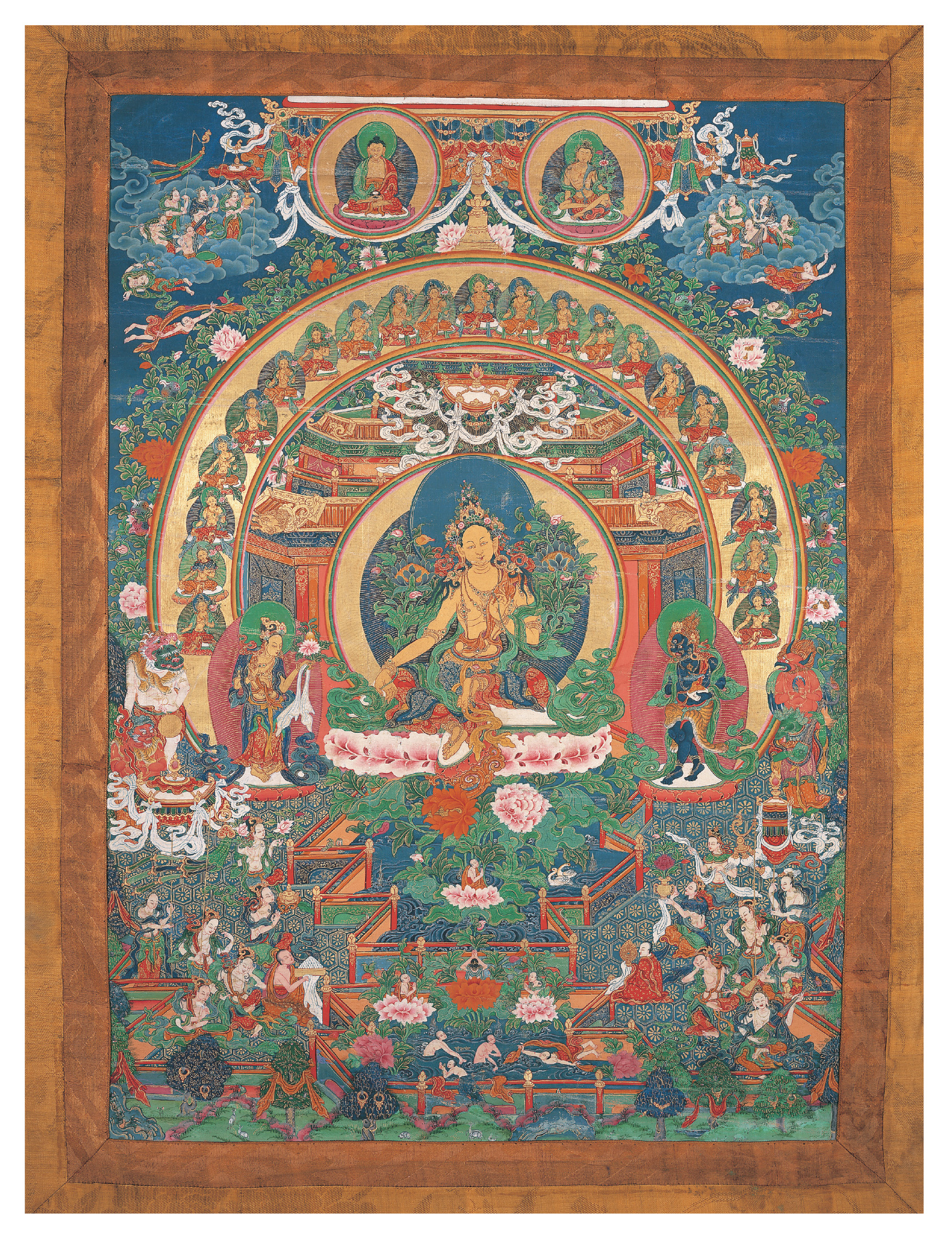 A painting of many Buddhas with the figure of Tara at the center of a circle.