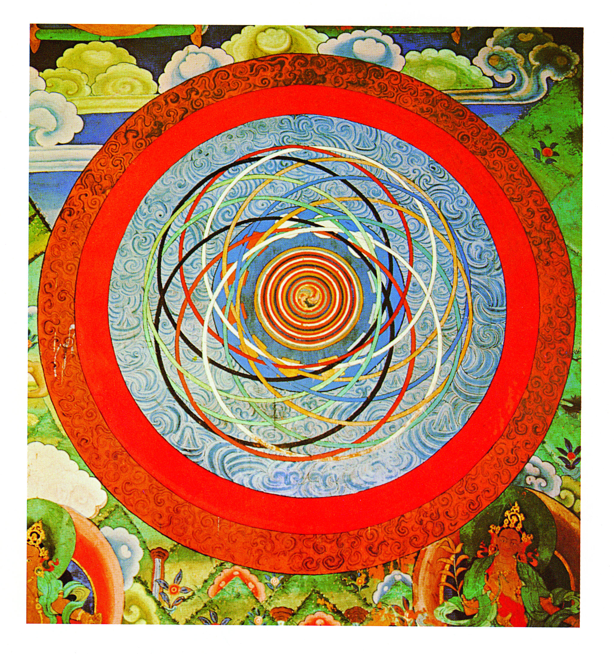 A richly colored mandala of concentric circles in red, blue, and gold.